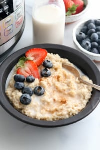 Instant Pot oatmeal topped with fruit in bowl