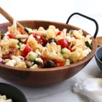 cauliflower salad from the side in wooden bowl