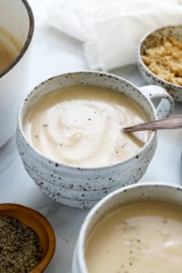 cauliflower soup in white mugs