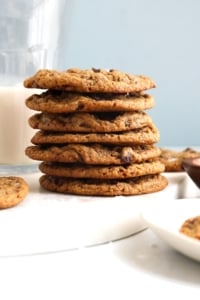 chickpea flour cookies stacked on marble board