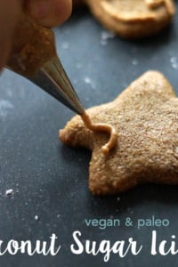 coconut sugar icing being pipped on cookie