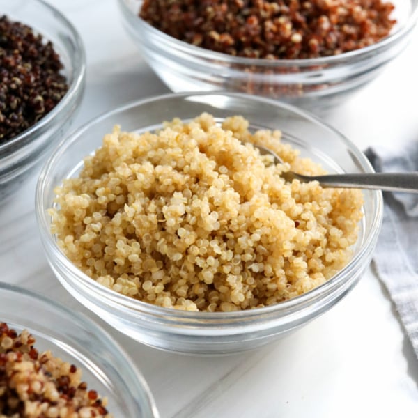 cooked quinoa in glass bowls.