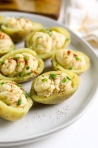 deviled potatoes on a white plate