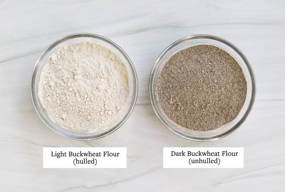 light vs dark buckwheat flour in glass bowls.