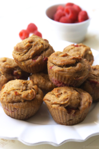 Peanut butter and Jelly Muffins stacked on plate