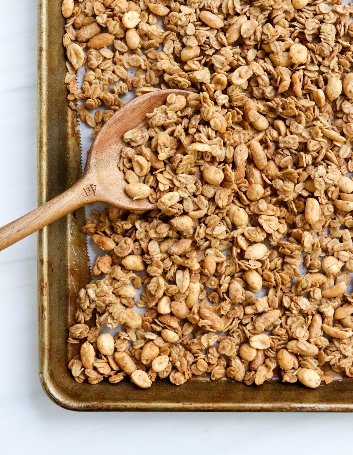 peanut butter granola on baking sheet.