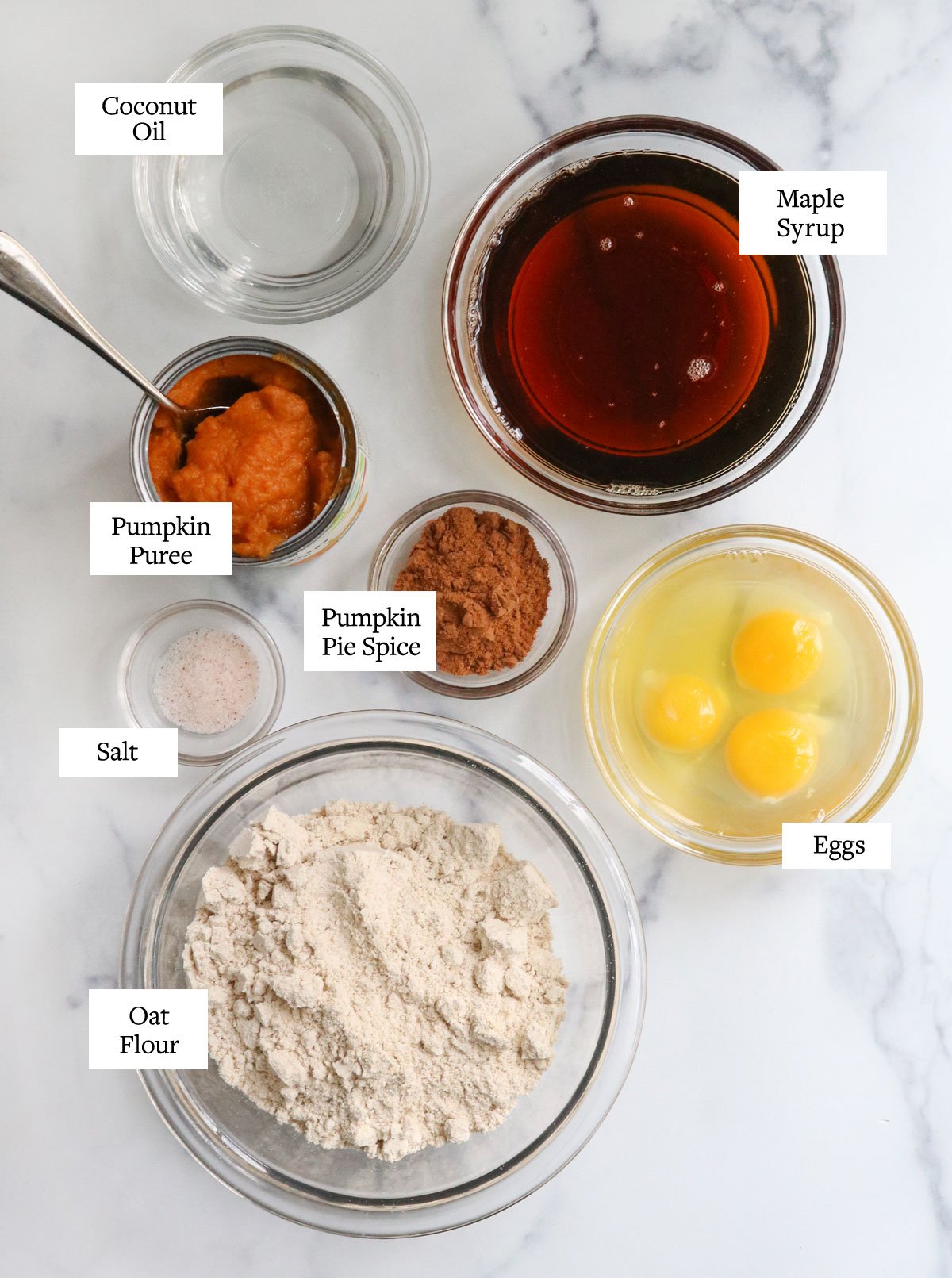 oat flour pumpkin bread ingredients in glass bowls