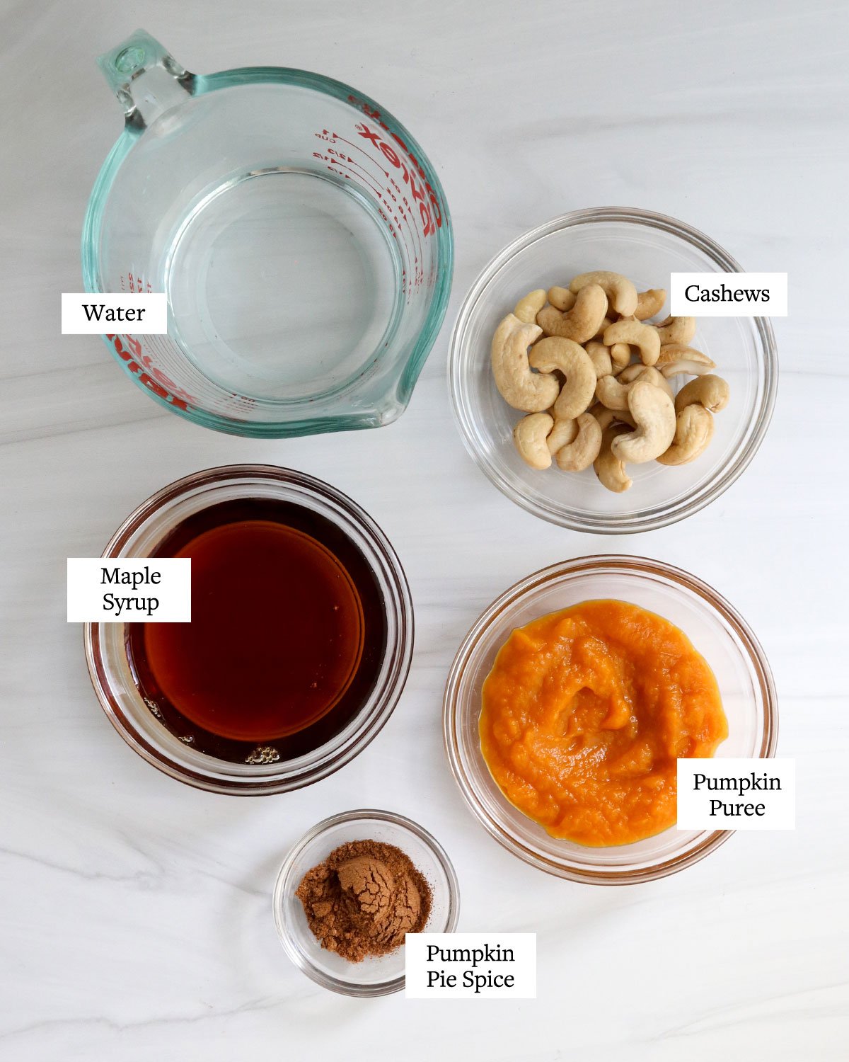 vegan pumpkin coffee creamer ingredients in small glass bowls