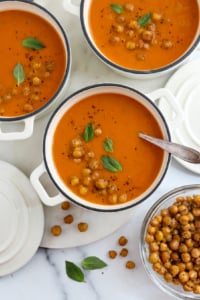 roasted tomato soup in 3 white bowls