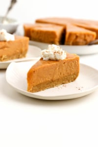 slice of vegan pumpkin cheesecake on plate