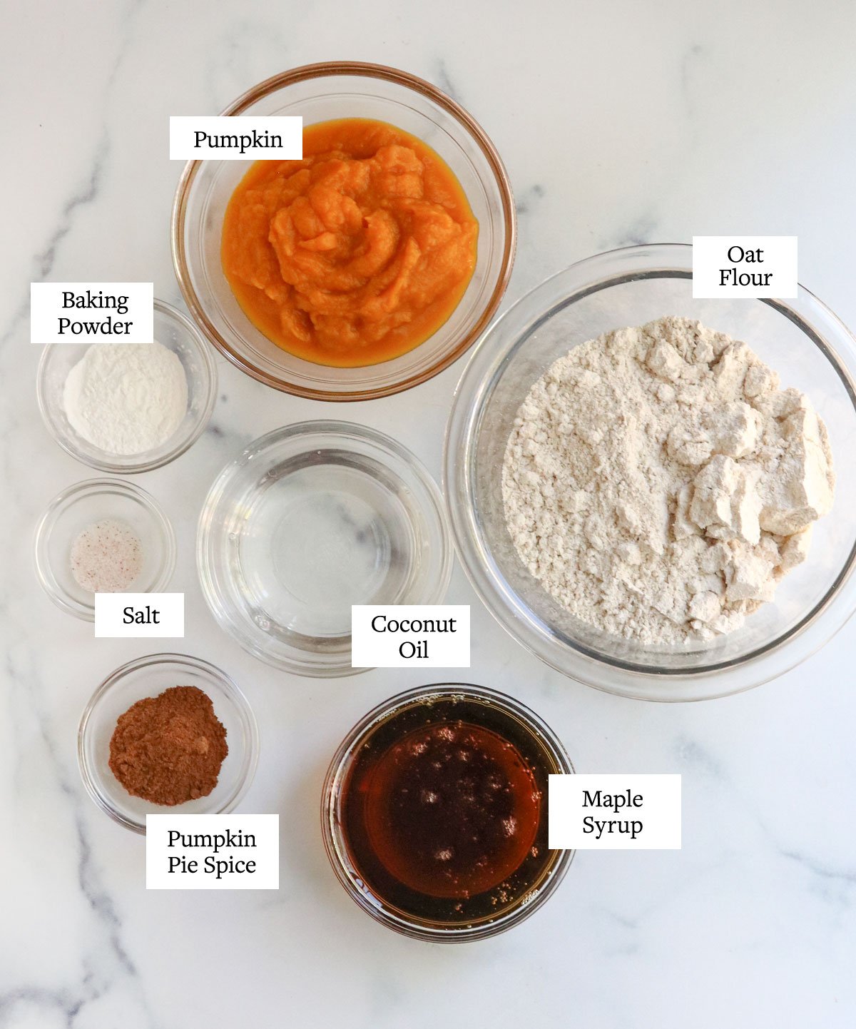 vegan pumpkin muffin ingredients in glass bowls